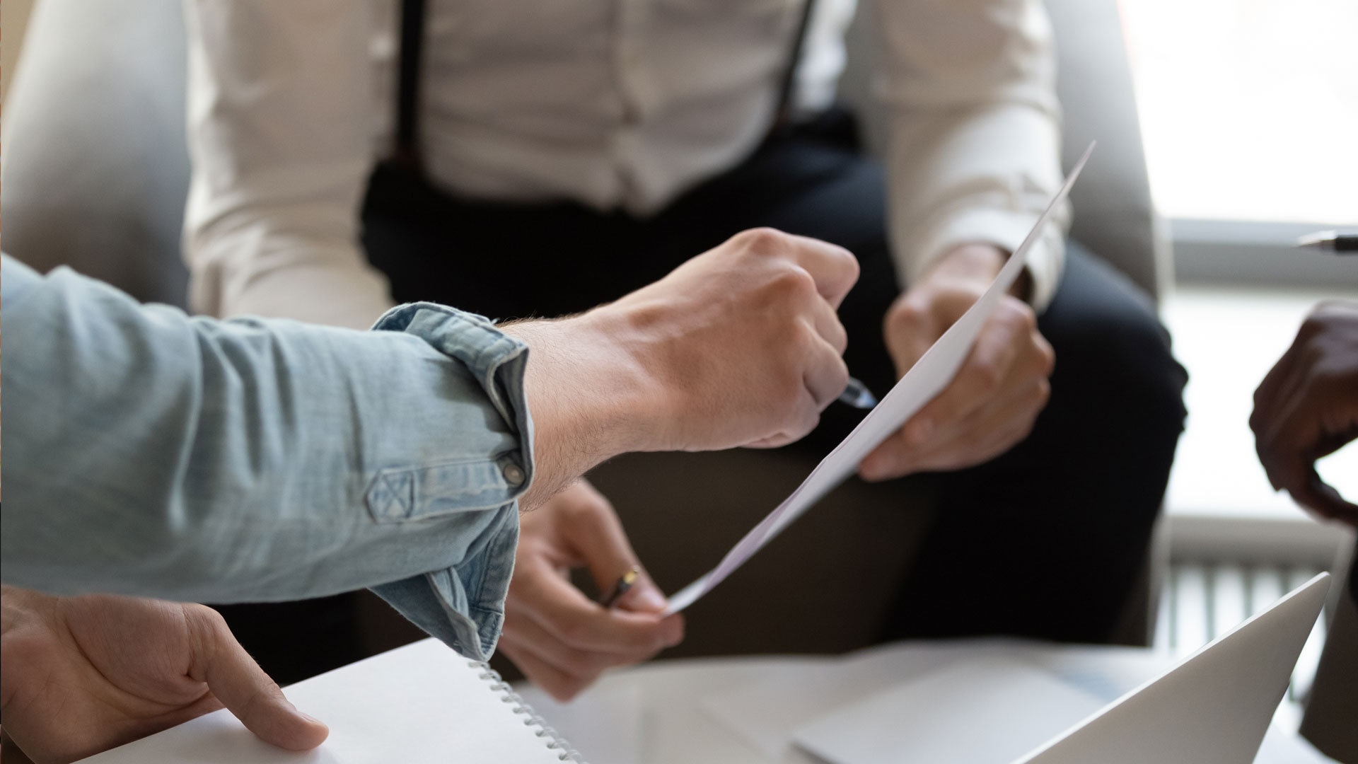 People reviewing paperwork