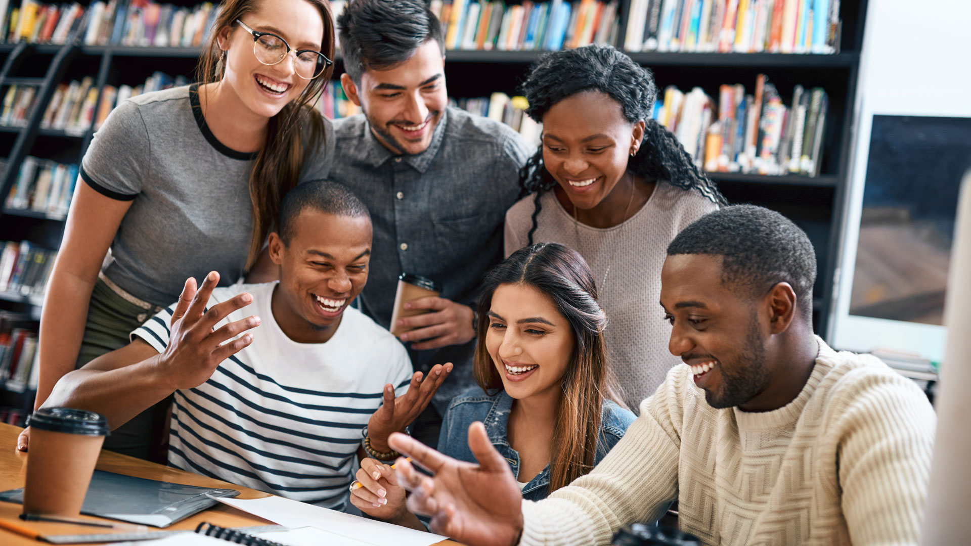 Students gathered around a table