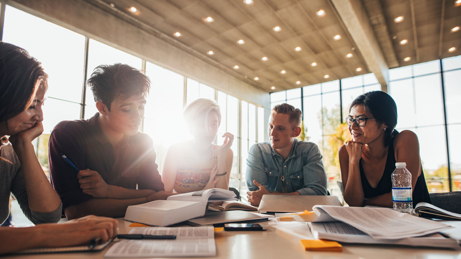 Students sitting around table