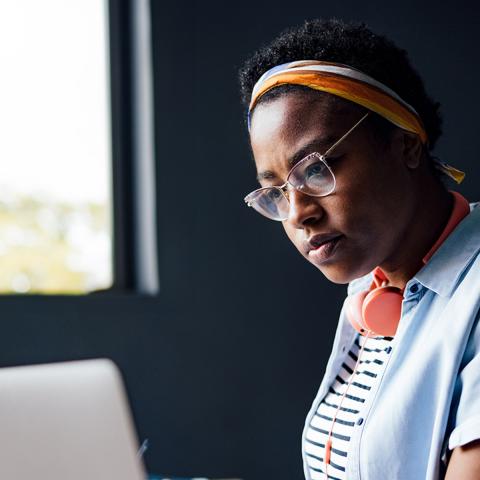 student with computer