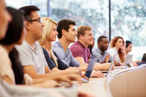 Students attending a lecture inside