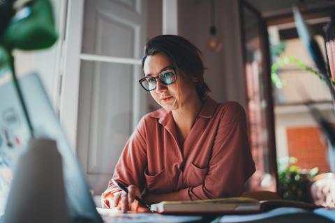 woman working on computer at home
