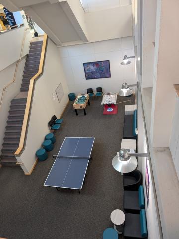 an overhead view of ping pong table and other games